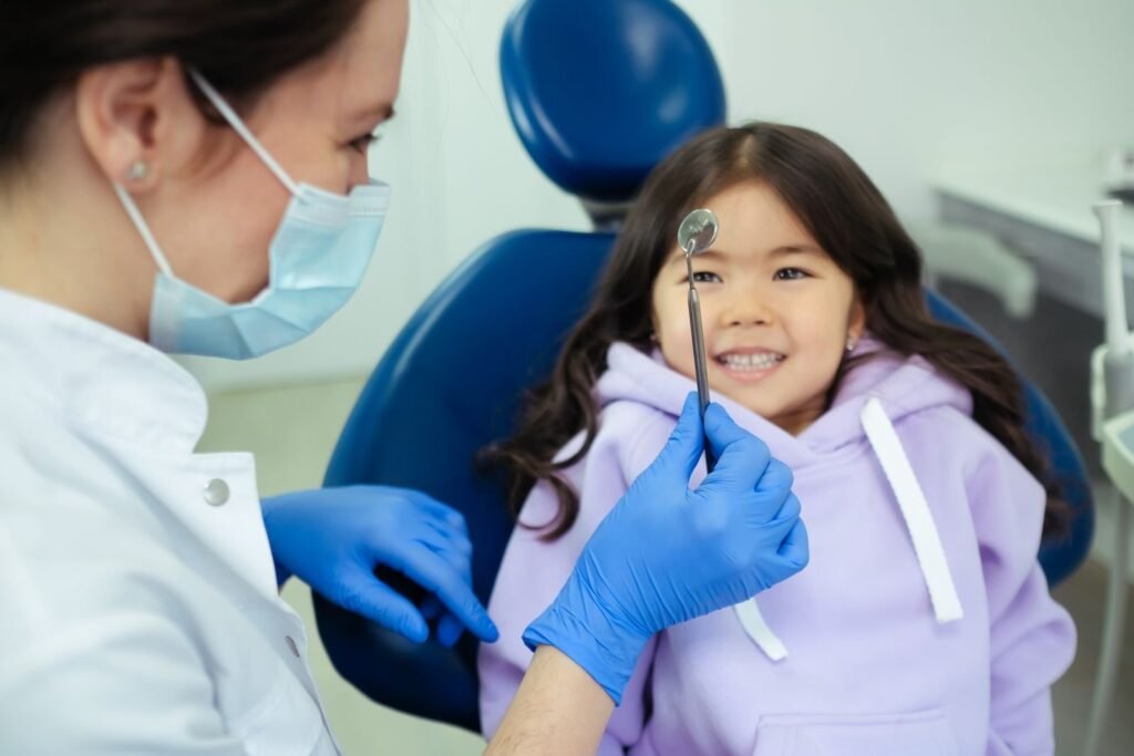 A child at her first dental check-up — kids dentistry in Dombivli